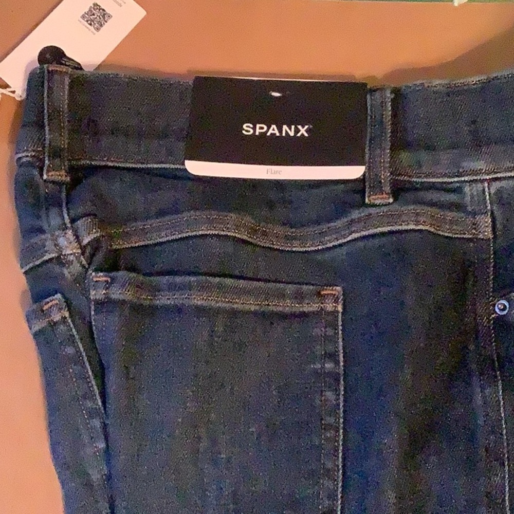 NWT Spanx Dark Blue Denim flare bottom Jeans never worn
